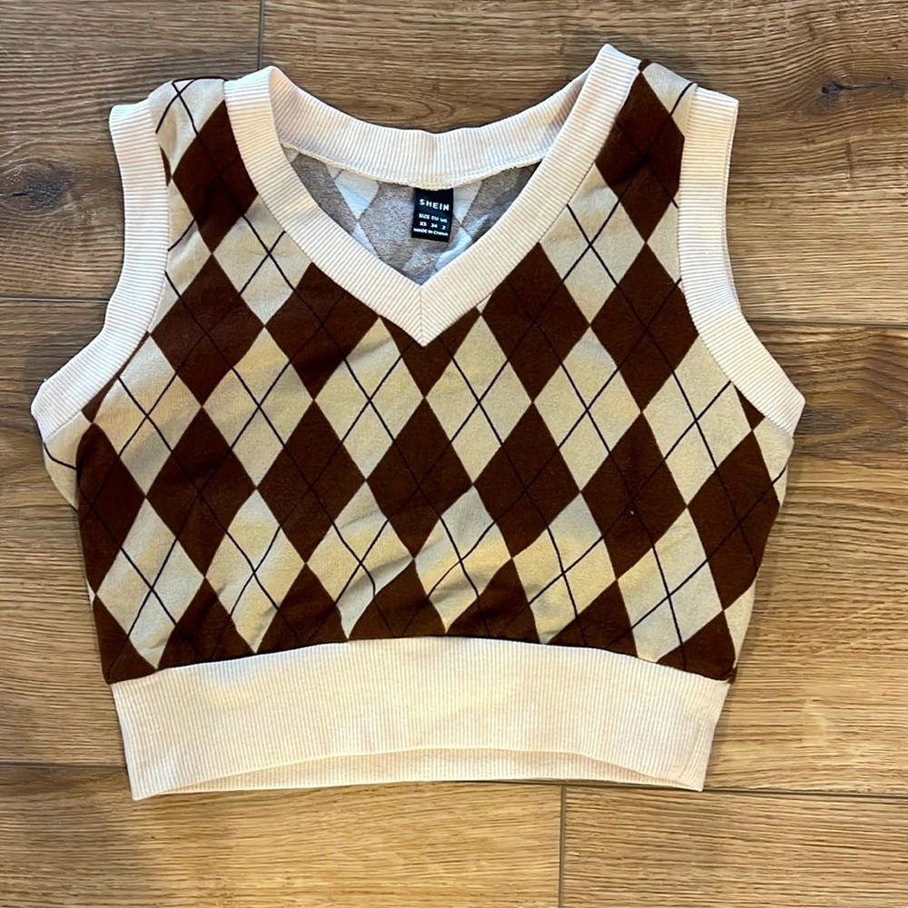 This is a sweater vest from Shein! Perfect for layering in the fall! :)